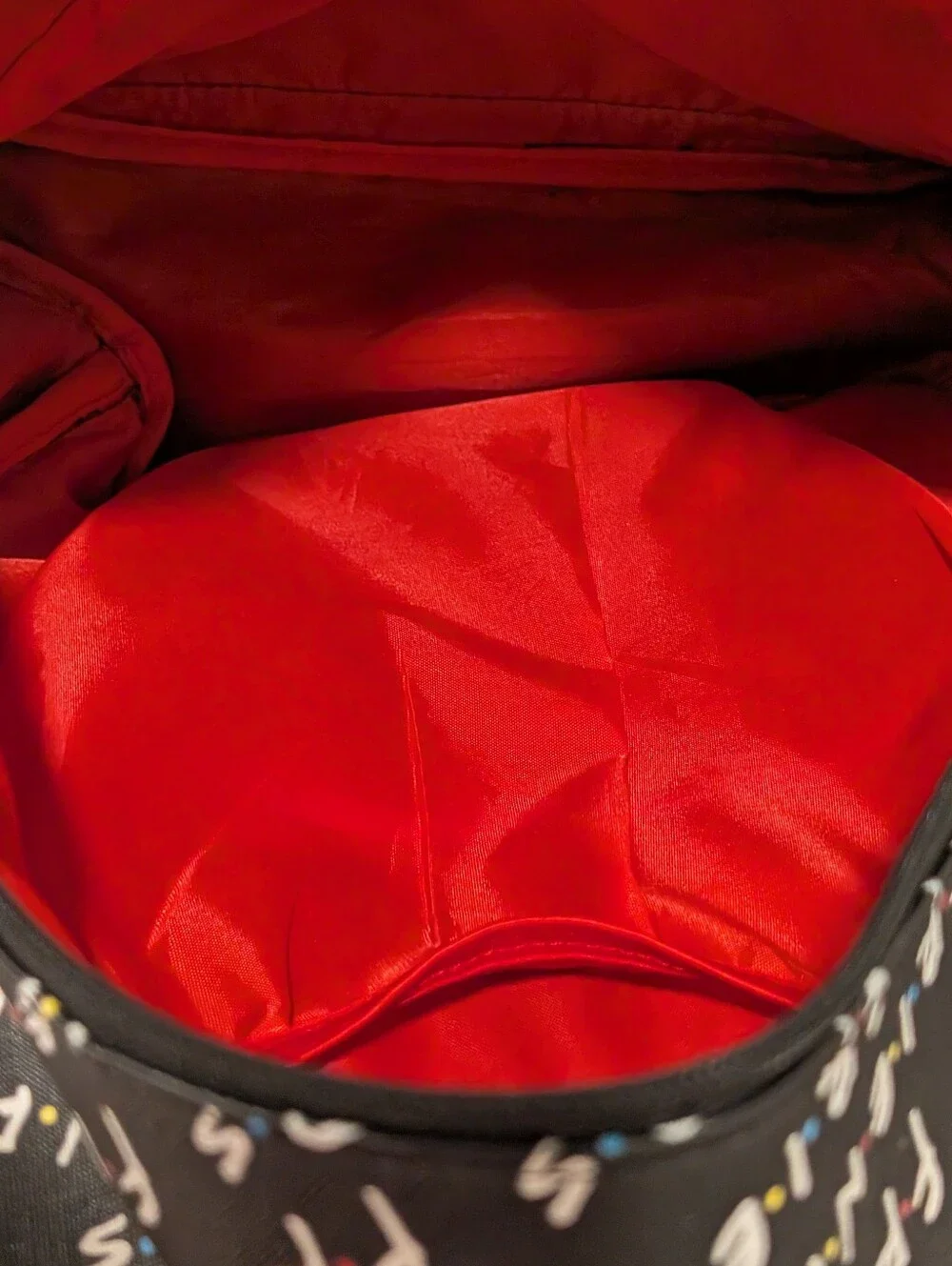 Friends Backpack all over print. need small repair see zoomed in photo